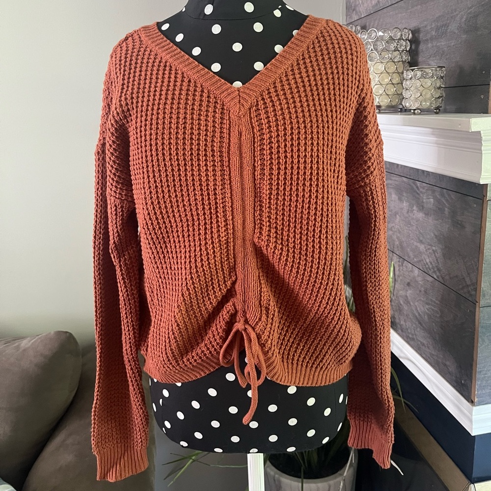 Auburn colored sweater